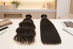 Side-by-side raw Vietnamese hair and virgin hair bundles on a salon quality-control table